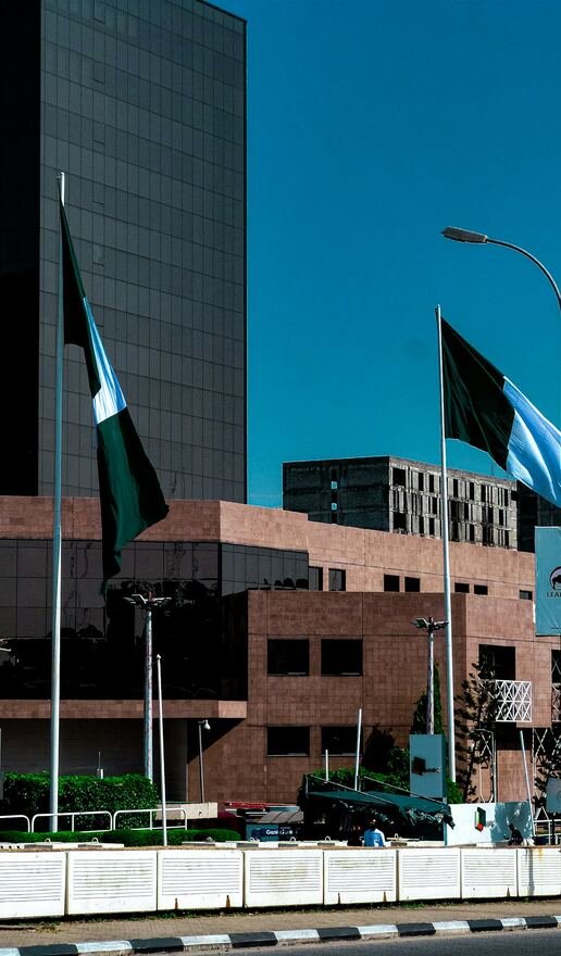 Abuja government buildings with Nigerian flags